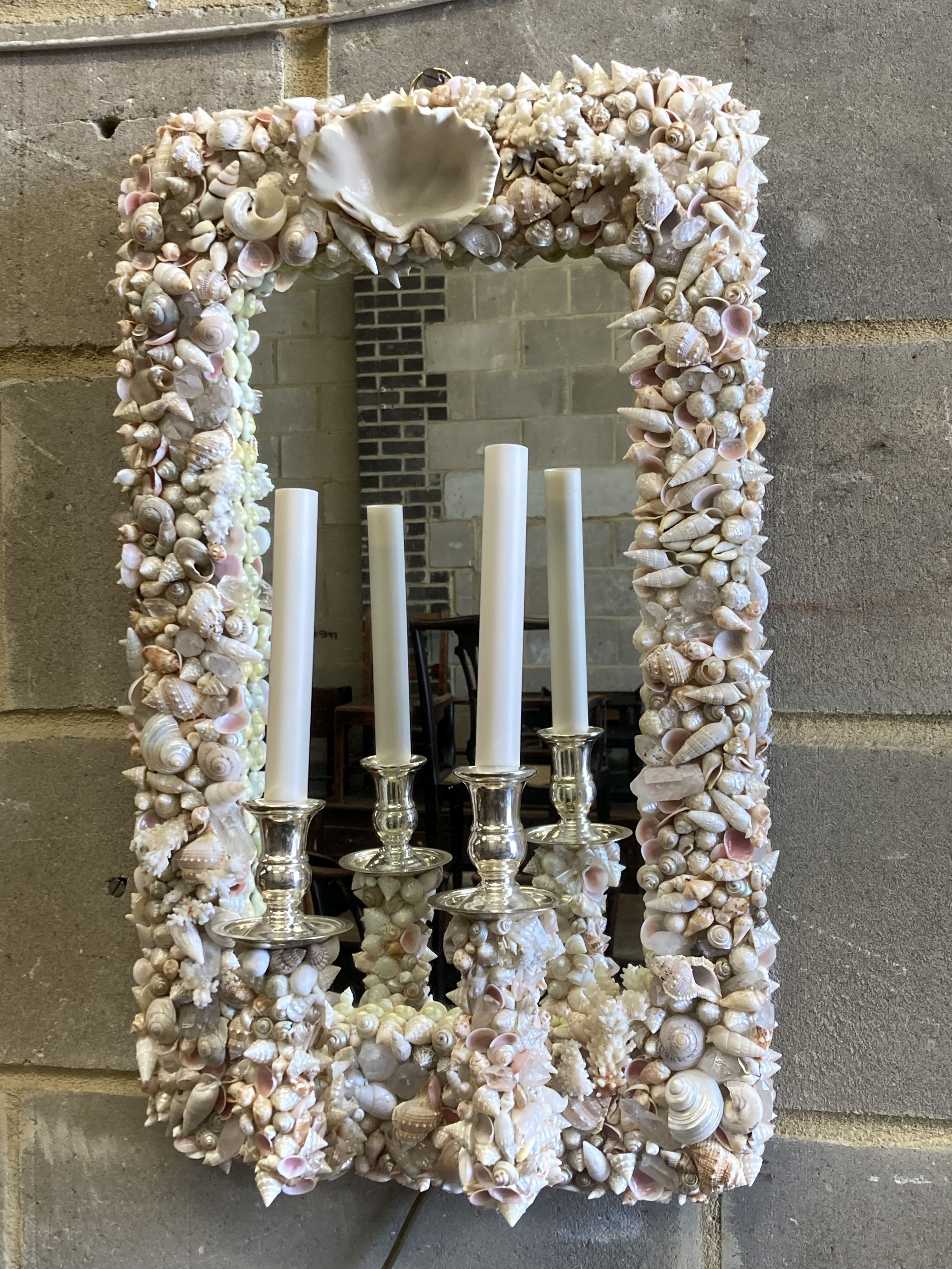 A pair of contemporary shell encrusted two-branch electric girandoles, width 39cm, height 64cm